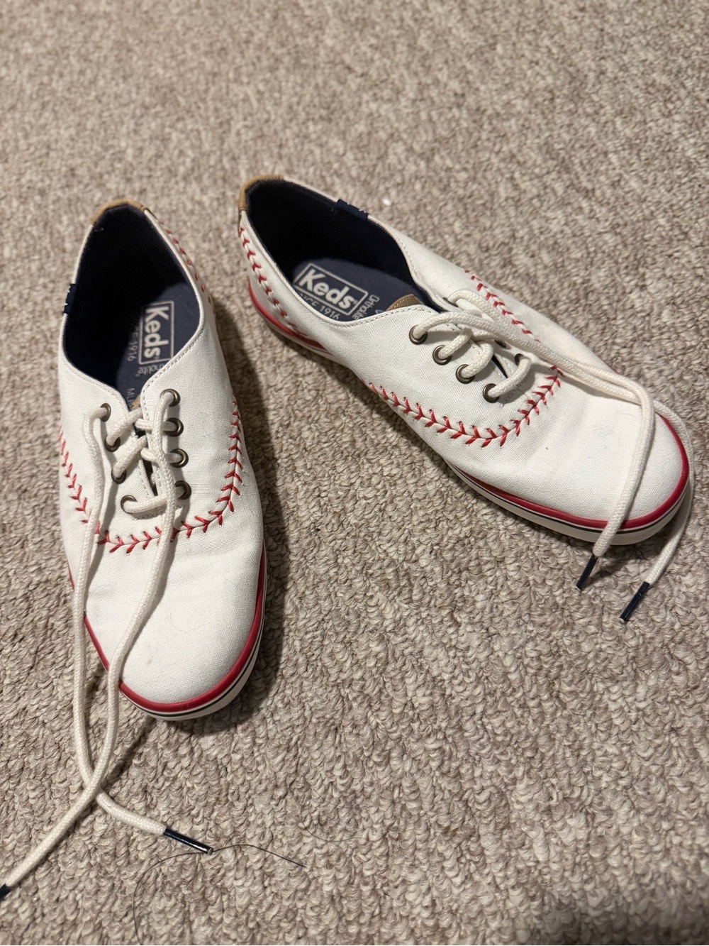 Keds White Canvas Sneakers with Red Stitching Detail